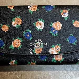 Coach Black Floral Clutch with Blue and Tan Accents